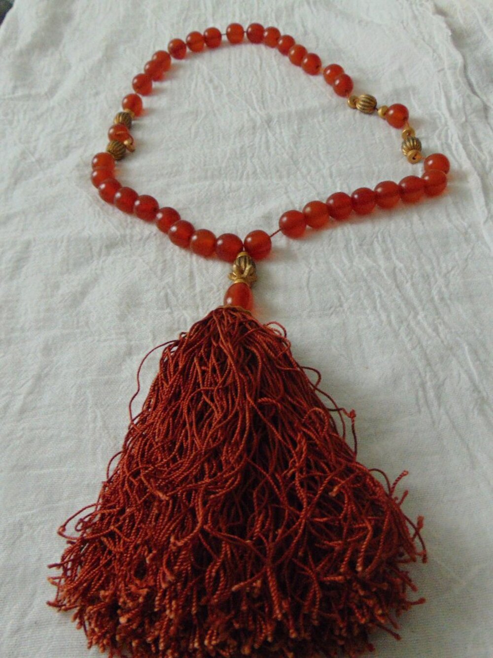 vintage antique cherry amber bakelite beaded necklace 87.gms. tassel necklace
